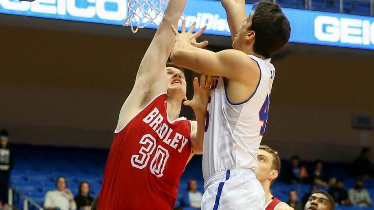 UTA forward Jorge Bilbao, right, puts up a shot over Bradley forward Callum Barker (30) during the first half Tuesday.