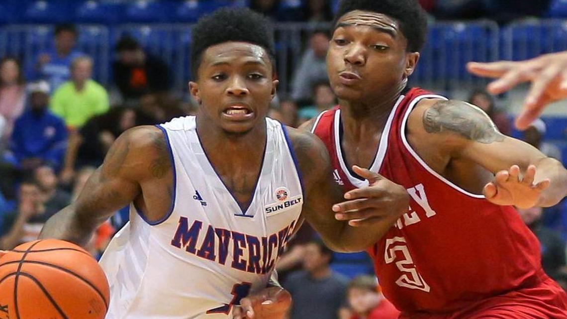 UT Arlington guard Erick Neal, left, ranks second in the Sun Belt with 5.3 assists per game.