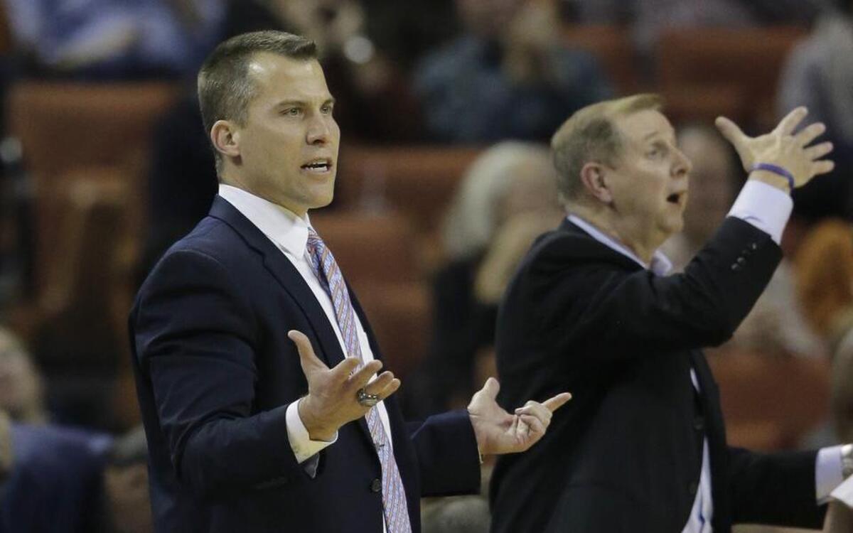 UTA men’s coach Scott Cross, left, became the program’s winningest coach Wednesday as the Mavericks took down two-time defending Sun Belt Conference champion Georgia State 85-70 at College Park Center.