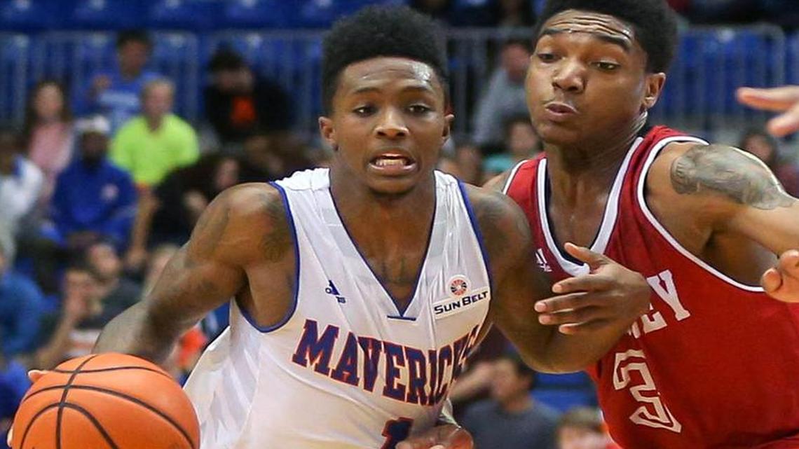 Erick Neal, left, made a critical 3-pointer with 2:16 left in the game, helping UT Arlington win a hard-fought Sun Belt game at Appalachian State.