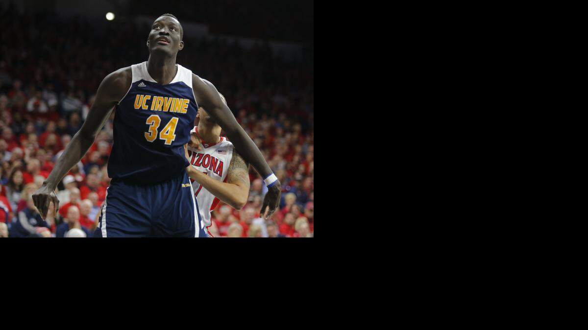 
UC Irvine center Mamadou Ndiaye, who is 7-foot-6 and 290 pounds, rebounds in the second half during against Arizona, Wednesday, Nov. 19, 2014, in Tucson, Ariz. 
