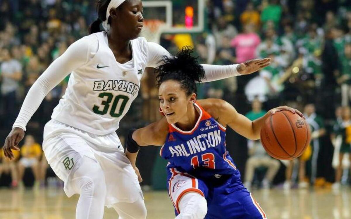 Baylor’s Alexis Jones (30) defends as UT Arlington guard LaShanda Green (13) moves the ball around the perimeter dyring the first half of an NCAA college basketball game Friday, Nov. 13, 2015, in Waco, Texas.