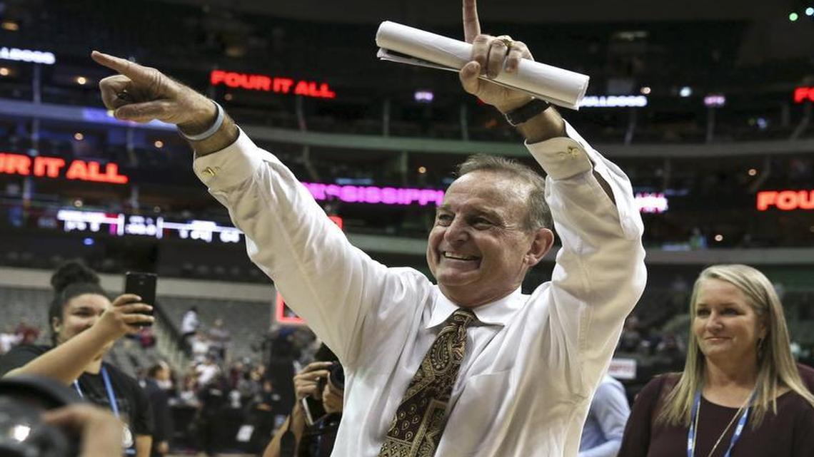 Mississippi State Lady Bulldogs head coach Vic Schaefer gestures to fans as he leaves the court after the 66-64 win over UConn in an NCAA Women’s Final Four semifinal at American Airlines Center in Dallas, Friday, March 31, 2017.