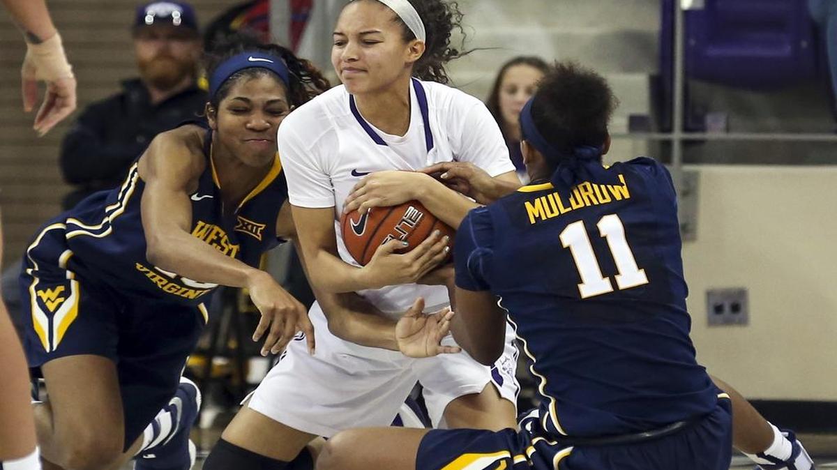 West Virginia’s Teana Muldrow, shown at right from earlier this season, had 19 points and eight rebounds as the Mountaineers pounded No. 19 Oklahoma in a Big 12 Conference women’s tournament quarterfinal game on Saturday.