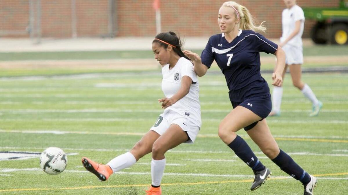 Kennedale’s Alondra Olmos (10) passes up the field during Kennedale’s 4A Region I semifinal victory over Stephenville on April 8, 2016, at Kennedale High School.