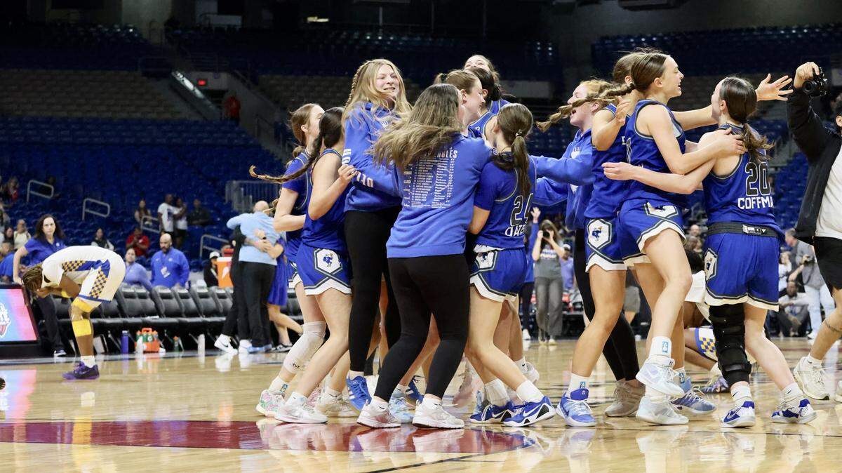 The Decatur Eagles celebrate their 58-54 overtime victory against Waco La Vega in the Class 4A Division I state championship on Friday, March 6, 2026, at the Alamodome in San Antonio.