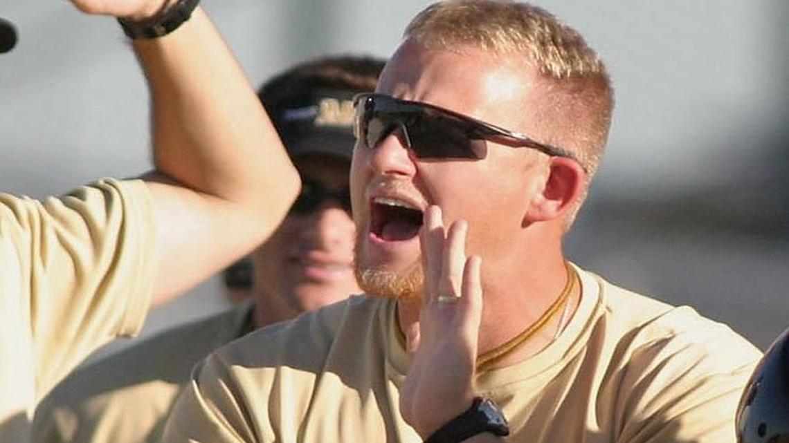In a 2005 photo, Mansfield football coach Daniel Maberry encourages players during practice.