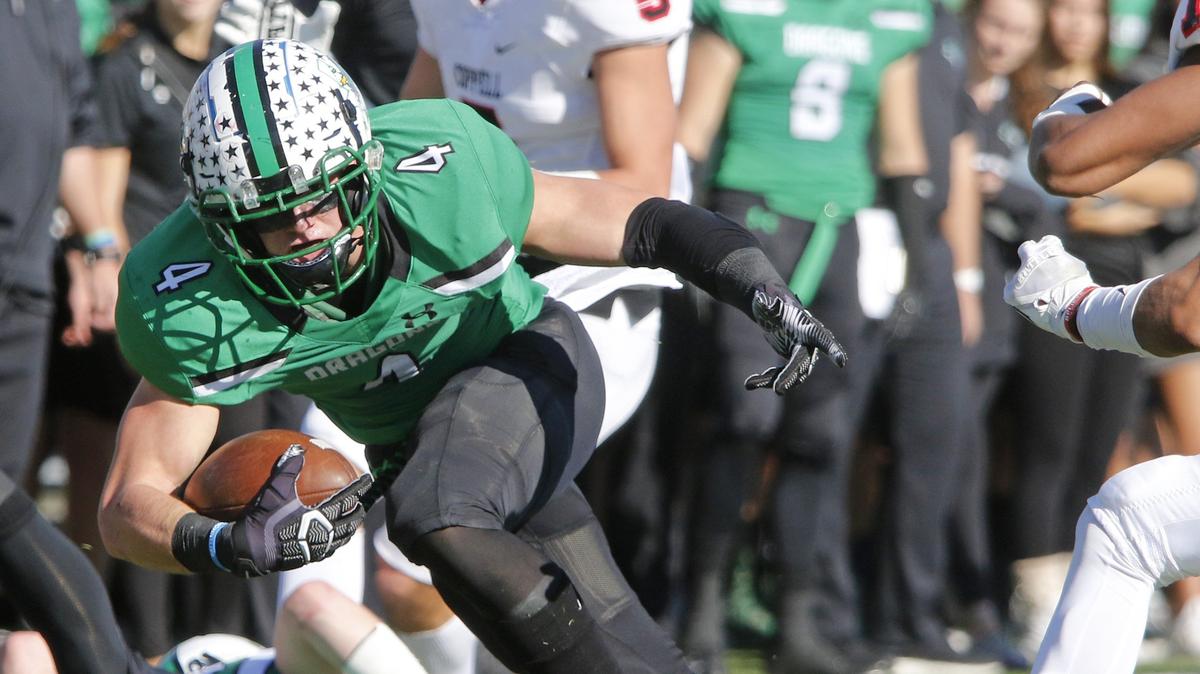 Southlake running back TJ McDaniel (4) takes off for the end zone during the first half of a high school Bi-district football playoff game at Dragon Stadium in Southlake, Texas, Saturday, Nov. 17, 2018. Southlake Carroll defeated Coppell 54-10. (Star-Telegram Bob Booth)