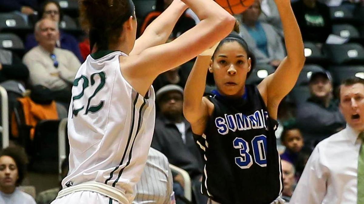 Summit guard Celsi Caraway (30) attempts a shot against Prosper forward Hannah Reynolds (22) during the first quarter.