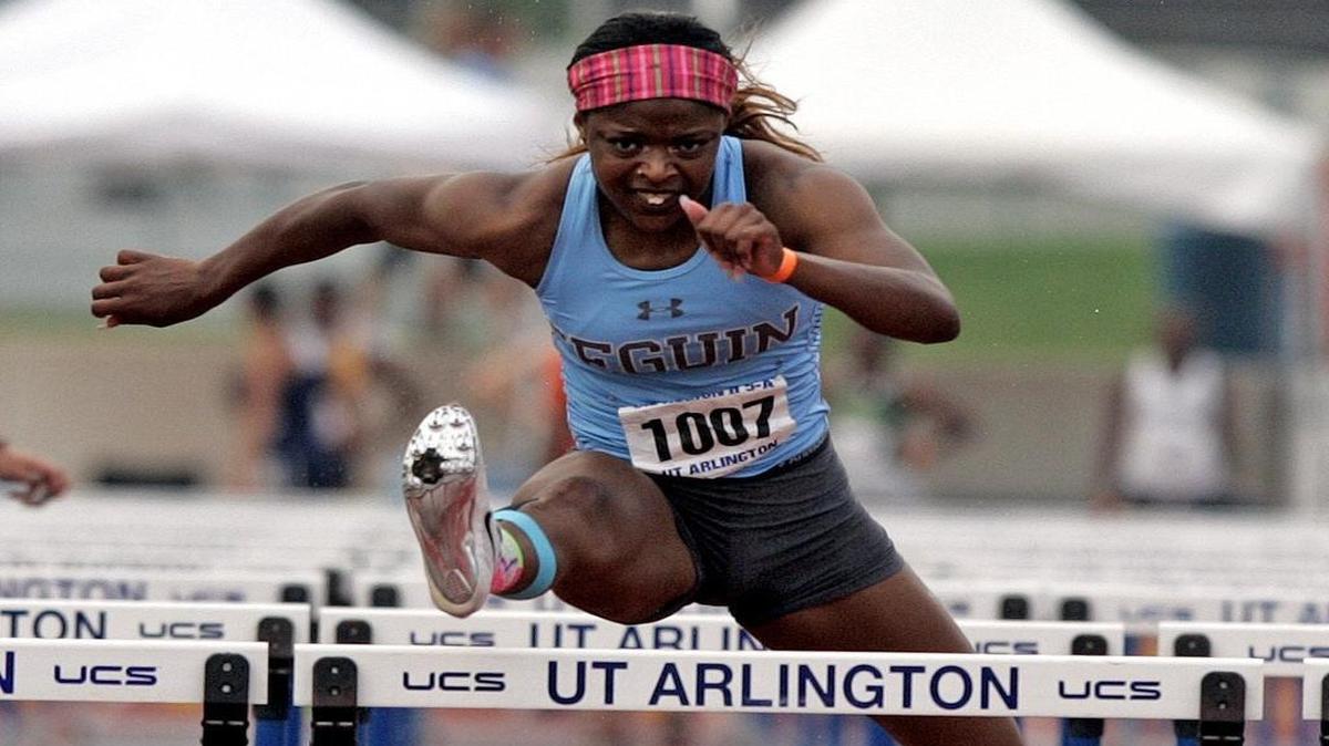 Arlington Seguin’s Tonea Marshall won the second heat of the Girls 100-meter hurdles at Mavericks Stadium in Arlington on Friday afternoon. Finals for the 5A and 6A high school regional meet will be held Saturday.