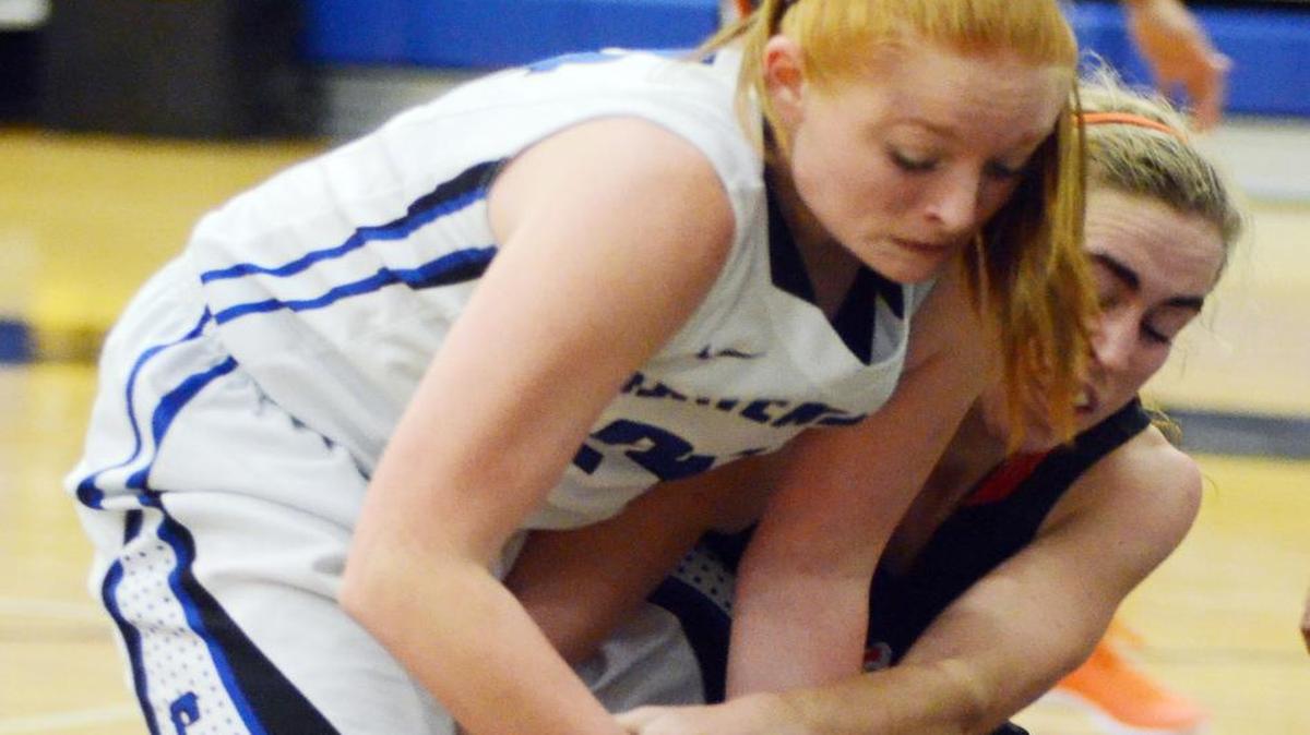Burleson Centennial forward Kayleigh Benson, left, and Aledo’s Cameron Huddleston contest a loose ball, Jan. 22, 2016.