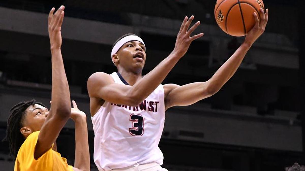 Justin Northwest sophomore Avery Anderson goes up for a shot against Fort Bend Marshall in the Class 5A boys semifinals at the Alamodome in San Antonio. Anderson led the Texans with 23 points.