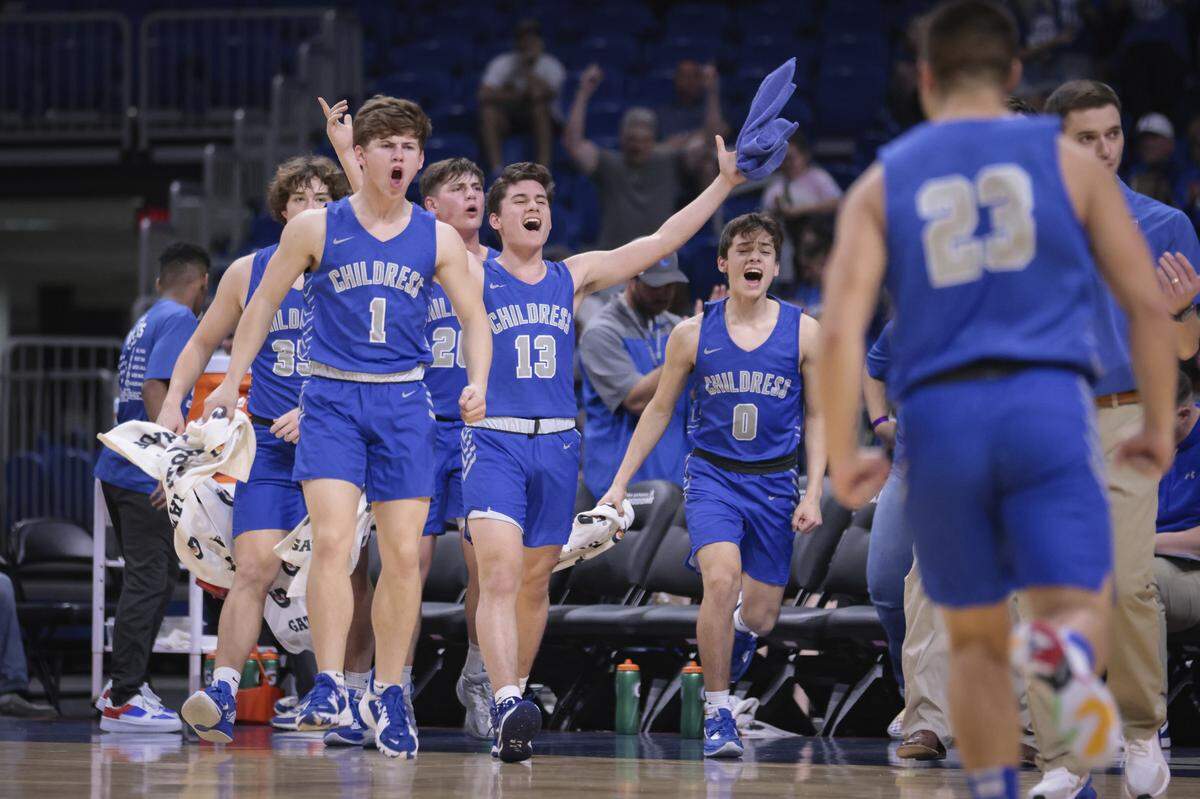 The Childress bench reacts during their Class 3A state semifinal with Lytle on Thursday, March 9, 2023 at the Alamodome in San Antonio, Texas. Childress won 69-48.