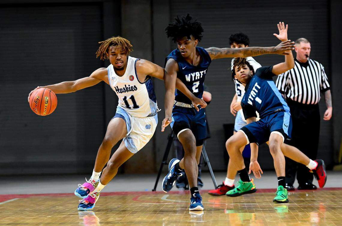 Wyatt’s D’Adrian Thomas (2) guards Chapin’s Bryson Goldsmith (11) while Chaparral’s Issiah Williams (1) shadows Huskie Diego Villanueva (5) in a Class 5A Region I semifinal on Friday, March 3, 2023 at Yeager Coliseum in Wichita Falls, Texas.