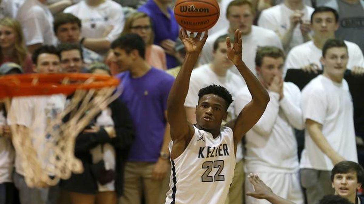 Keller Indians guard R.J. Nembhard (22) shoots a three-pointer against the Denton Guyer Wildcats in the second half of high school boys basketball at Keller High School in Keller, Texas on Friday, Feb. 12, 2016.