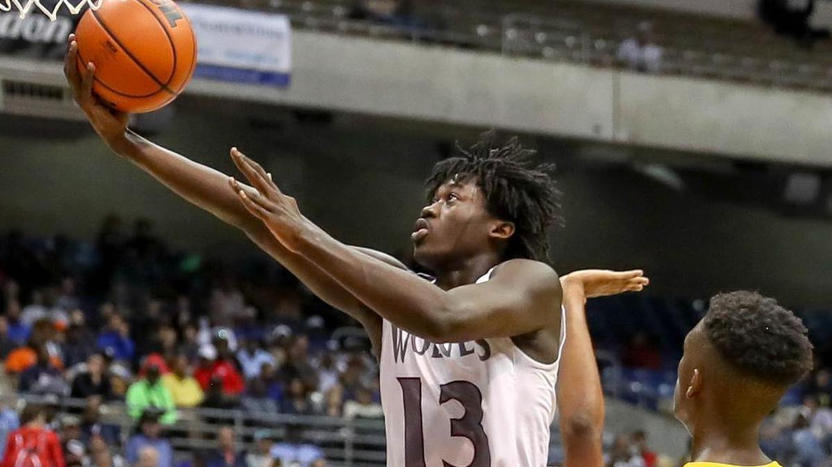 Timberview guard Isaac Likekele (13) drives to the basket against Fort Bend Marshall during the UIL 5A boys basketball state final at the Alamodome in San Antonio, March 11, 2017.