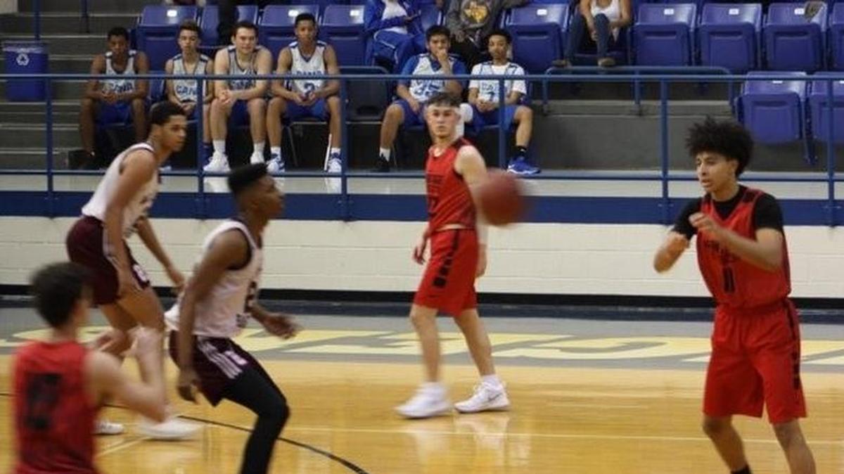 Josh Heerman, right, passes in recent action.