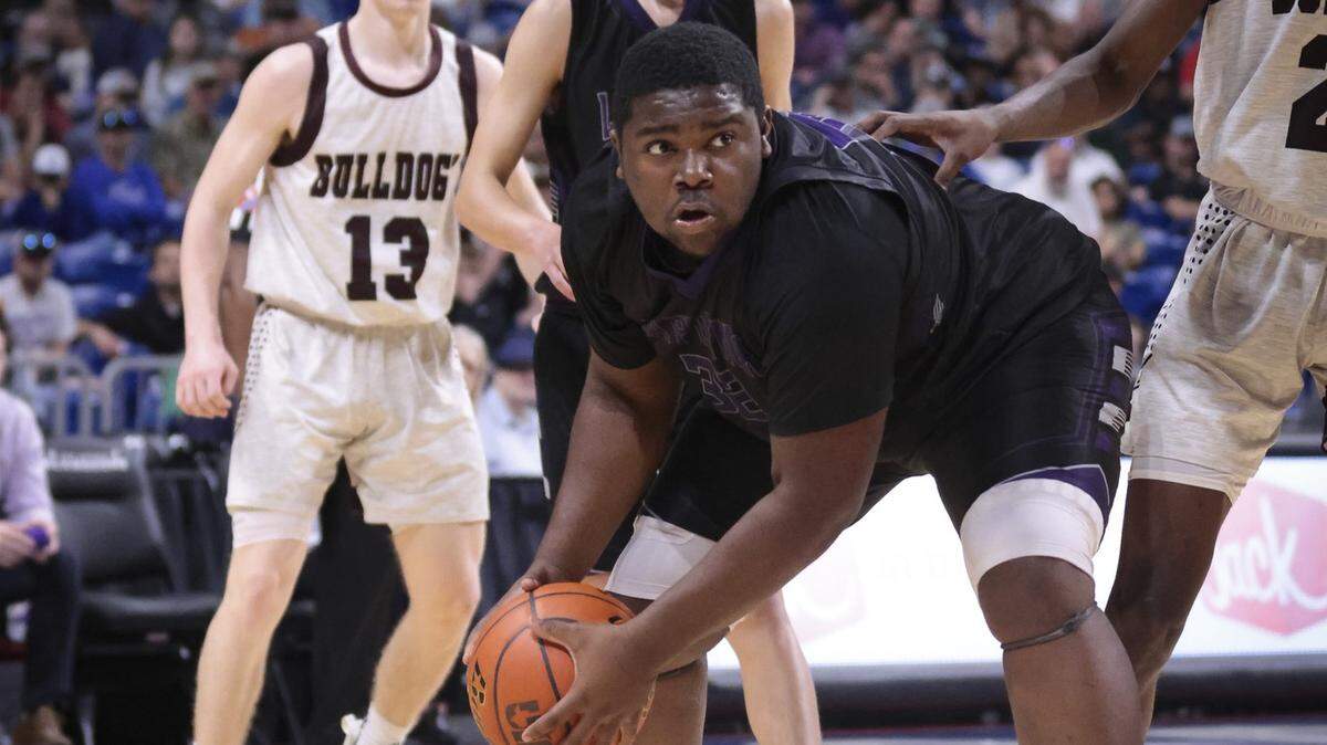 LaRue LaPoynor’s Dijuan Whitehead looks for room to score in the Flyers’ win over Flatonia in the Class 2A state semifinals on Friday, March 10, 2023 at the Alamodome in San Antonio, Texas. LaPoynor won 66-43.