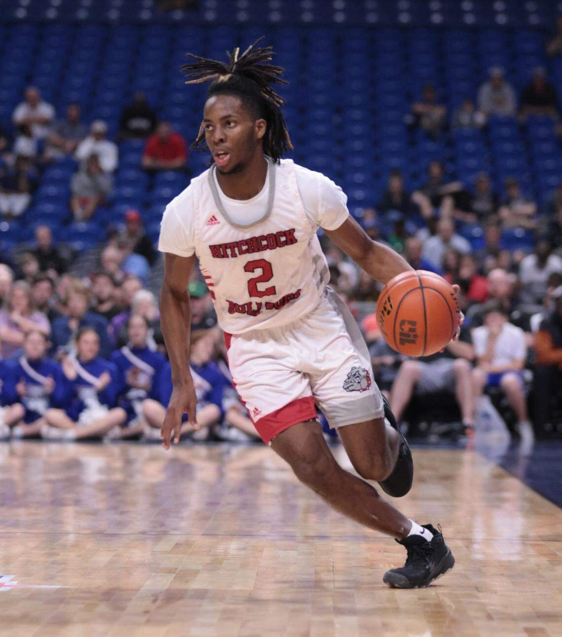 Hitchcock’s Damien McDaniel dribbles up court for the Bulldogs in the Class 3A state championship game against Childress on Saturday, March 11, 2023 at the Alamodome in San Antonio, Texas. McDaniel was the title game MVP.