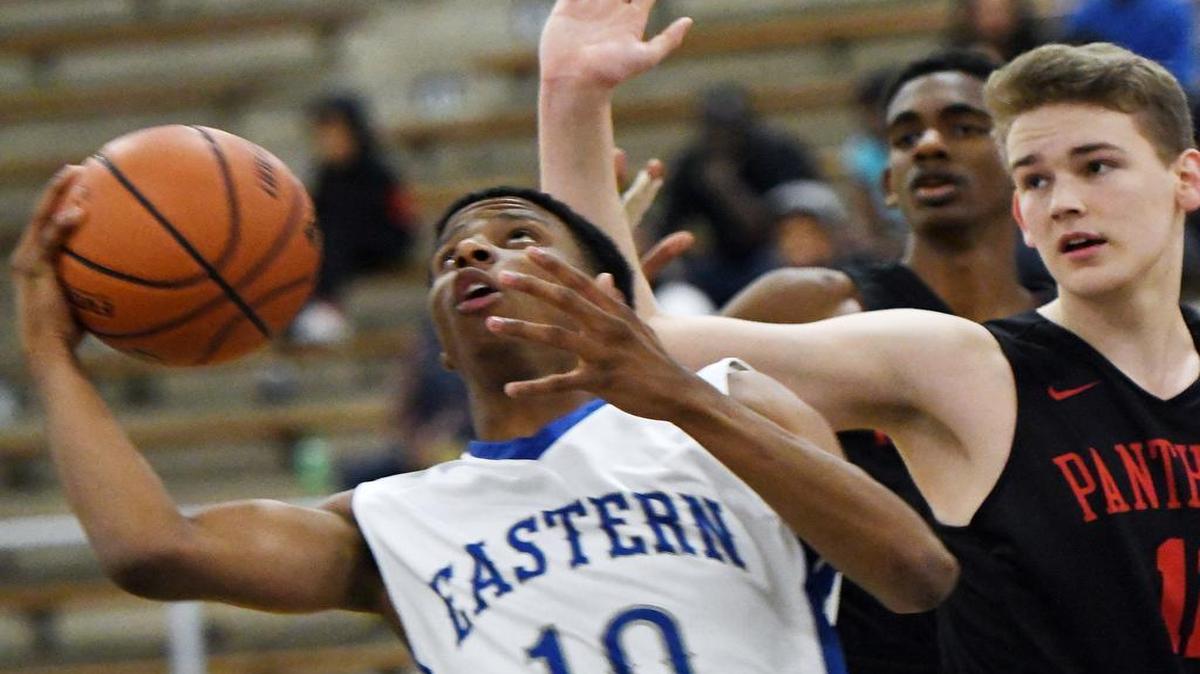 Eastern Hills guard Miguel Encarnacion (10) draws coverage from Colleyville Heritage player Logan Kari in a game last month. Eastern Hills won 72-64.