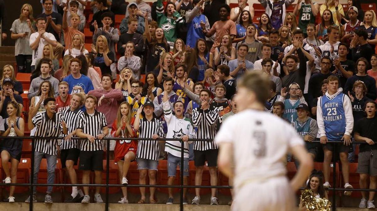 Keller Indians fans cheer on the boys team in a 2017 basketball playoff game at Wilkerson-Greines Activity Center in Fort Worth.