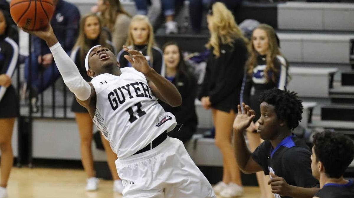 Guard De'Vion Harmon (11) is a major weapon for Denton Guyer.