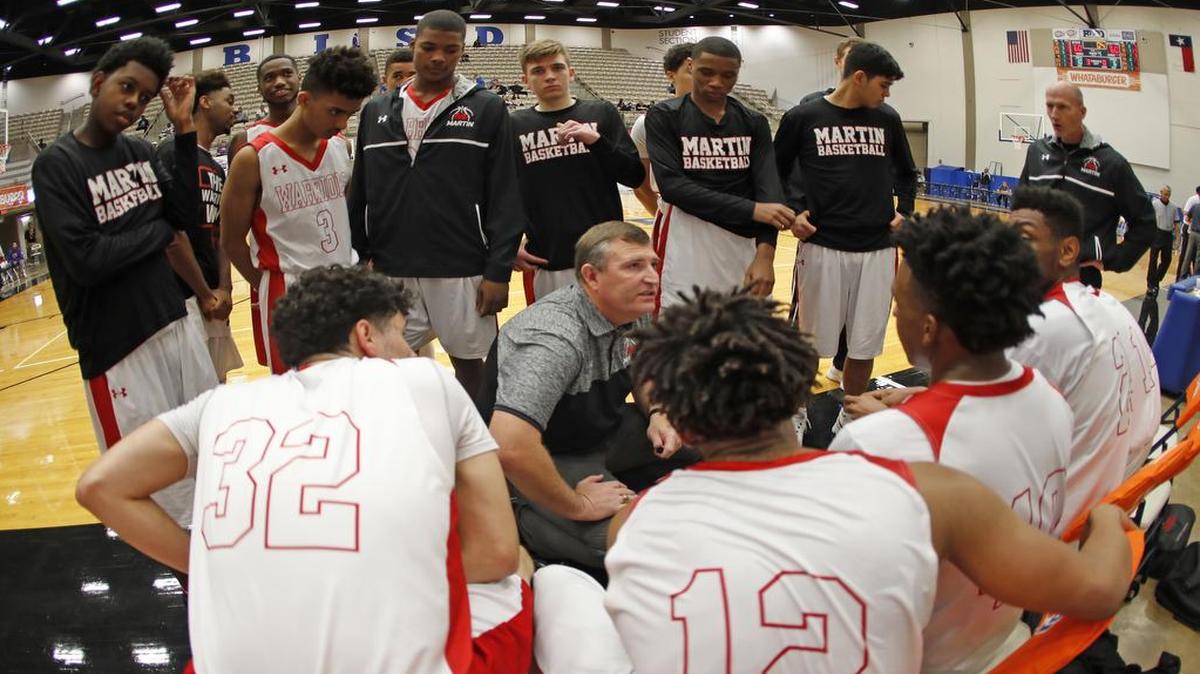 Martin head coach Clint Schnell talks to the team in a Whataburger Orange Division basketball tournament game at W. G. Thomas Coliseum Wednesday morning Dec. 28, 2016.