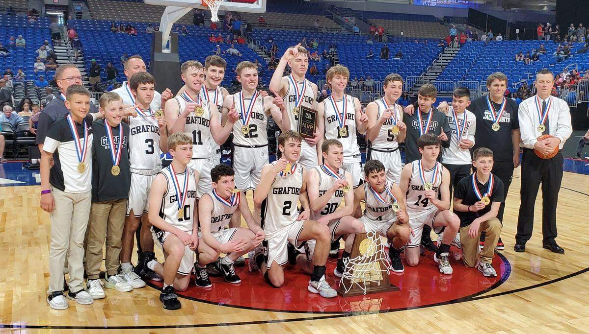 The Graford Jackrabbits pose with their UIL Class 1A state championship trophy and medals after defeating Jayton on Saturday, March 11, 2023 at the Alamodome in San Antonio, Texas