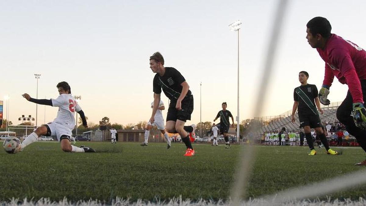 From 2014, a UIL boys soccer playoff game at Cravens Field in Arlington
