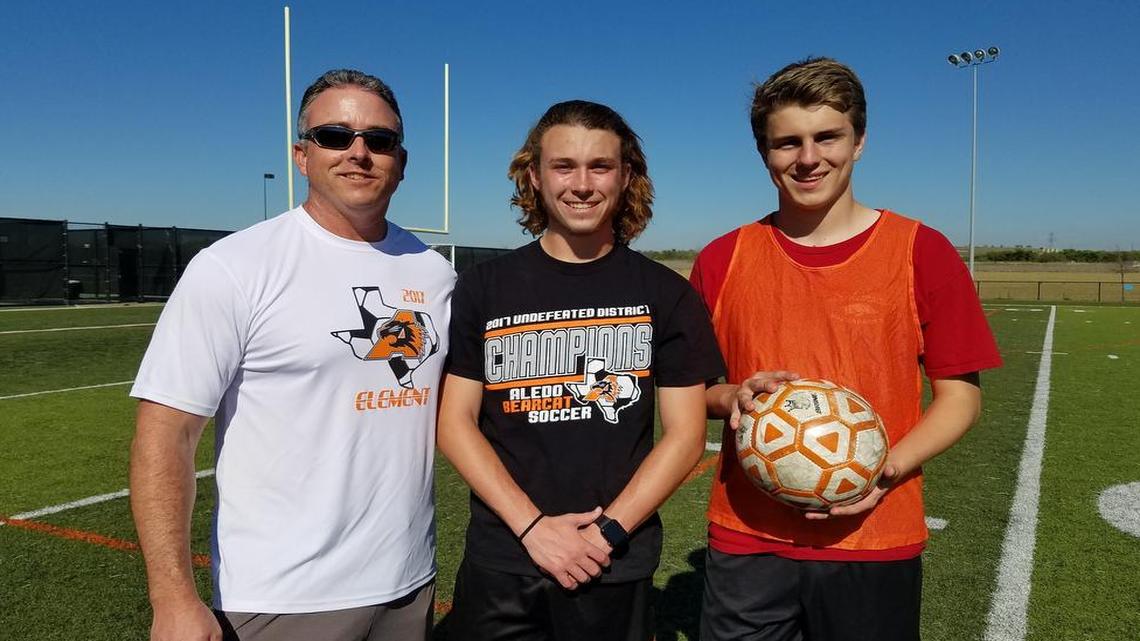 From left, Aledo boys soccer coach Derek Vierling, Reed Vierling and Quinn Davis, March 27, 2017