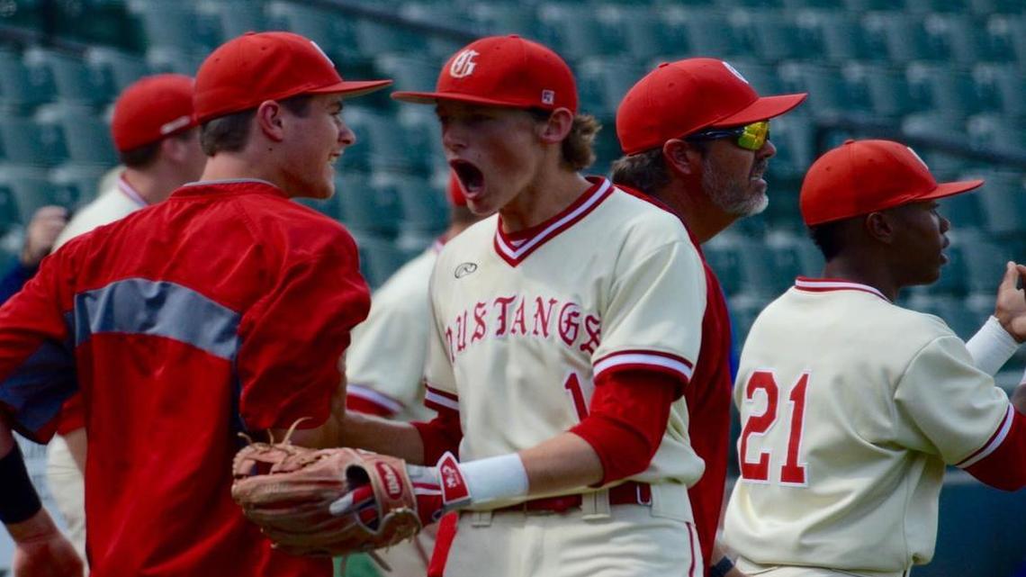 Grapevine third baseman Ryan Drake celebrates after the Mustangs got out of a jam in the first inning.