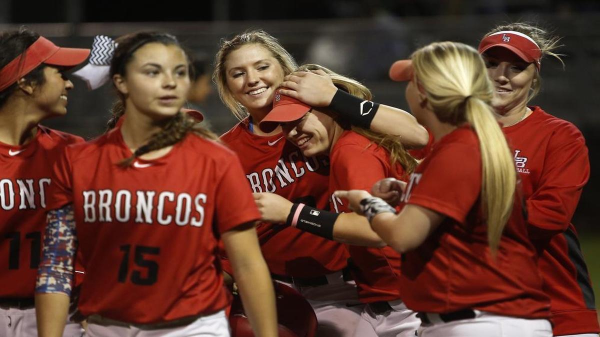 Mansfield Legacy continued to roll after completing a sweep of their Class 5A Region II area-round series against Mount Pleasant on Saturday. Reagan Wright, middle, shown earlier this season giving a teammate a hug, hit two home runs to give her 33 in her career.