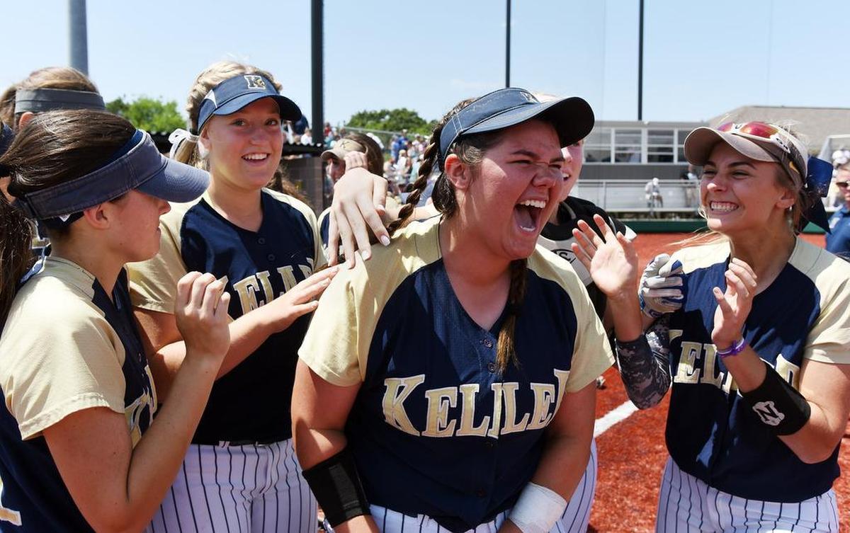 Keller pitcher Dylann Kaderka, center, said she and her teammates had a mini-concert before each game.