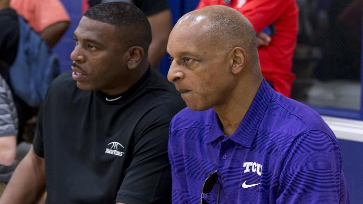 
Trent Johnson of TCU, right, and Tony Benford of North Texas watch teams play Saturday at the Great American Shootout in Duncanville. They are among the many coaches from across the country who attend the summer tournament.


