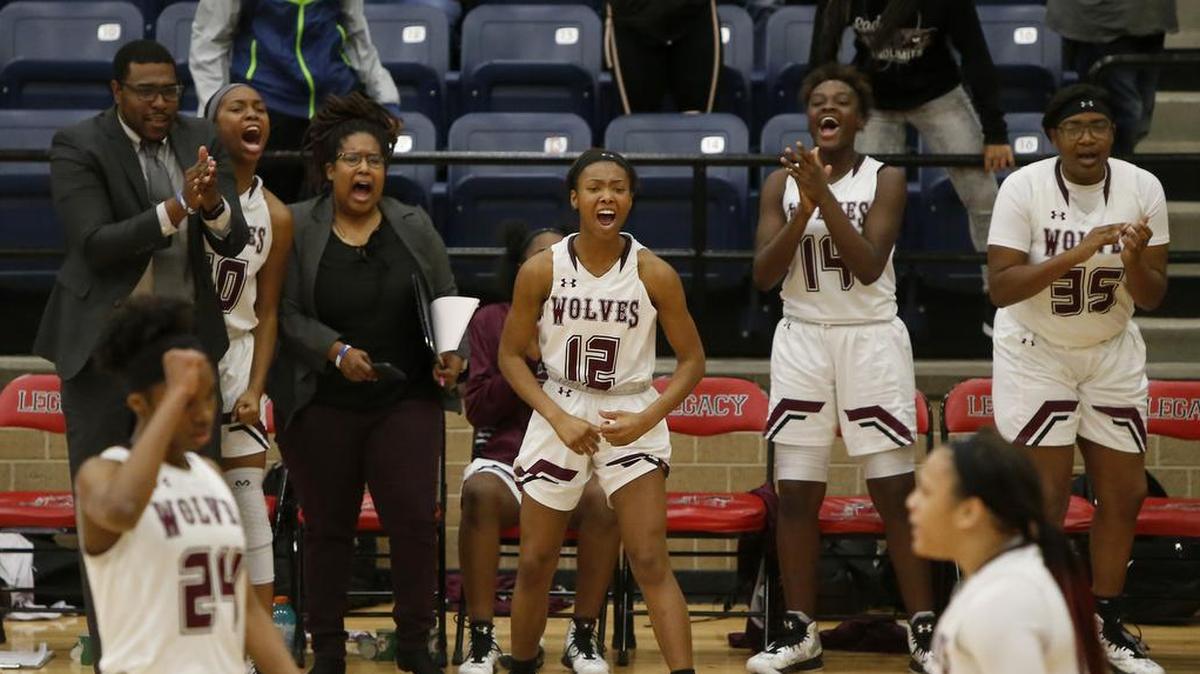 The Mansfield Timberview Lady Wolves bench erupts after the team retook the lead late in the second half against the Cedar Hill Lady Longhorns in the Mansfield Spring Creek Invitational high school girls basketball tournament at Legacy High School in Mansfield, Texas on Thursday, Dec. 29, 2016.
