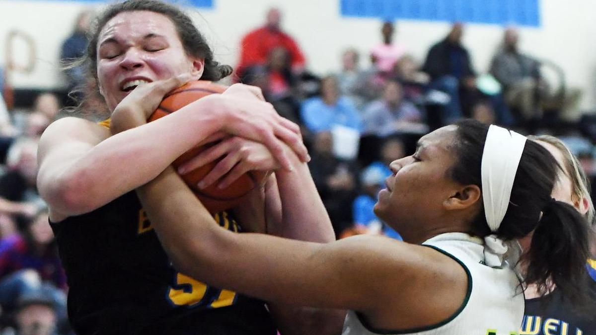 Saginaw Boswell guard Audrey Warrren, left, and Birdville’s Savannah Lawson battle for a loose ball, Feb. 17, 2017 at Trophy Club Nelson High School. Birdville won in overtime 41-39.