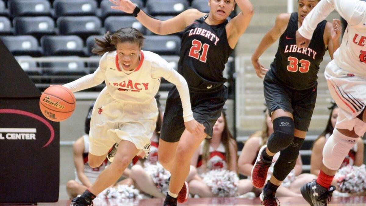 Legacy’s Harmoni Turner works the ball up the floor Friday against Liberty.