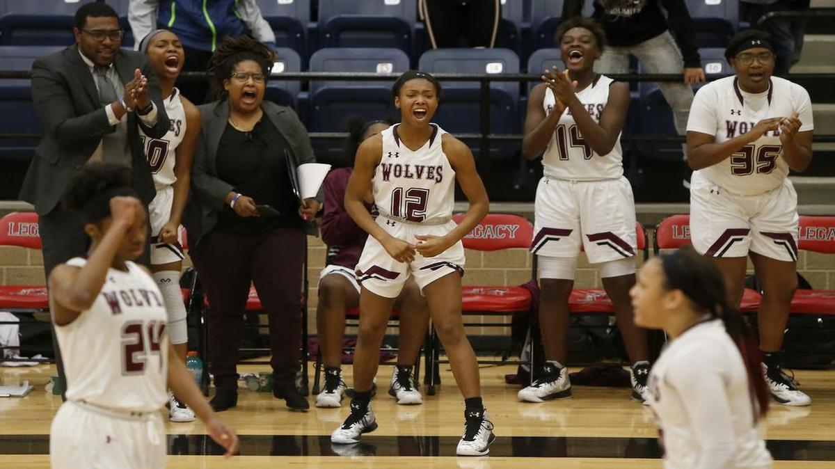 The Mansfield Timberview bench erupts after the team retook the lead late in the second half against the Cedar Hill in the Mansfield Spring Creek Invitational, Dec. 29, 2016. Timberview won 67-62.