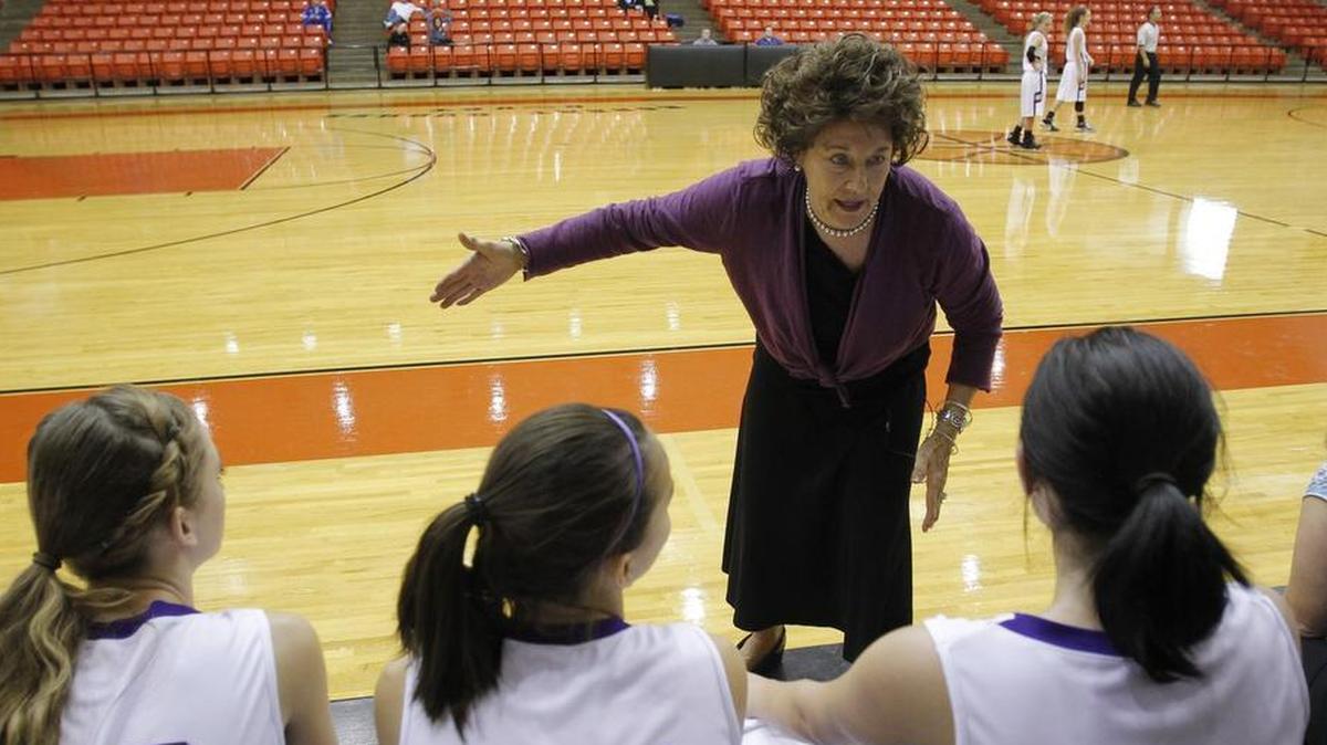 Granbury coach Leta Andrews gives instruction to her team before a game with Cedar Hill in 2010. Andrews retired with 1,416 career victories, most by any high school basketball coach in history.