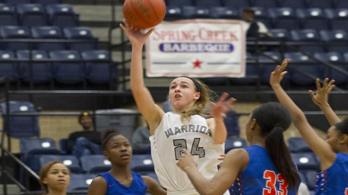 Arlington Martin #24 Tatum Henderson attempts a shot on the final day of Spring Creek Barbeque Mansfield Invitational.