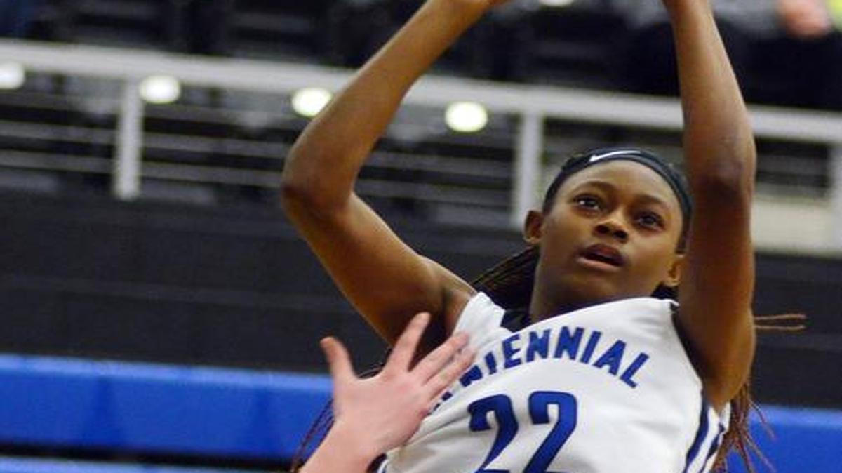 Burleson Centennial's Kertisa Amos goes up for a jump shot vs. Aledo during the first period of Friday's January 22, 2016 basketball game.