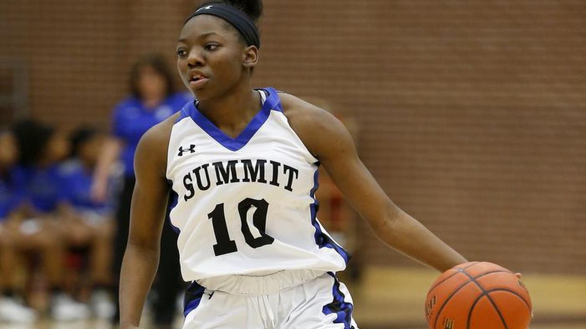 Mansfield Summit Amber Dixon (10) brings the ball down court against Grapevine on Wednesday, Dec. 28, 2016.