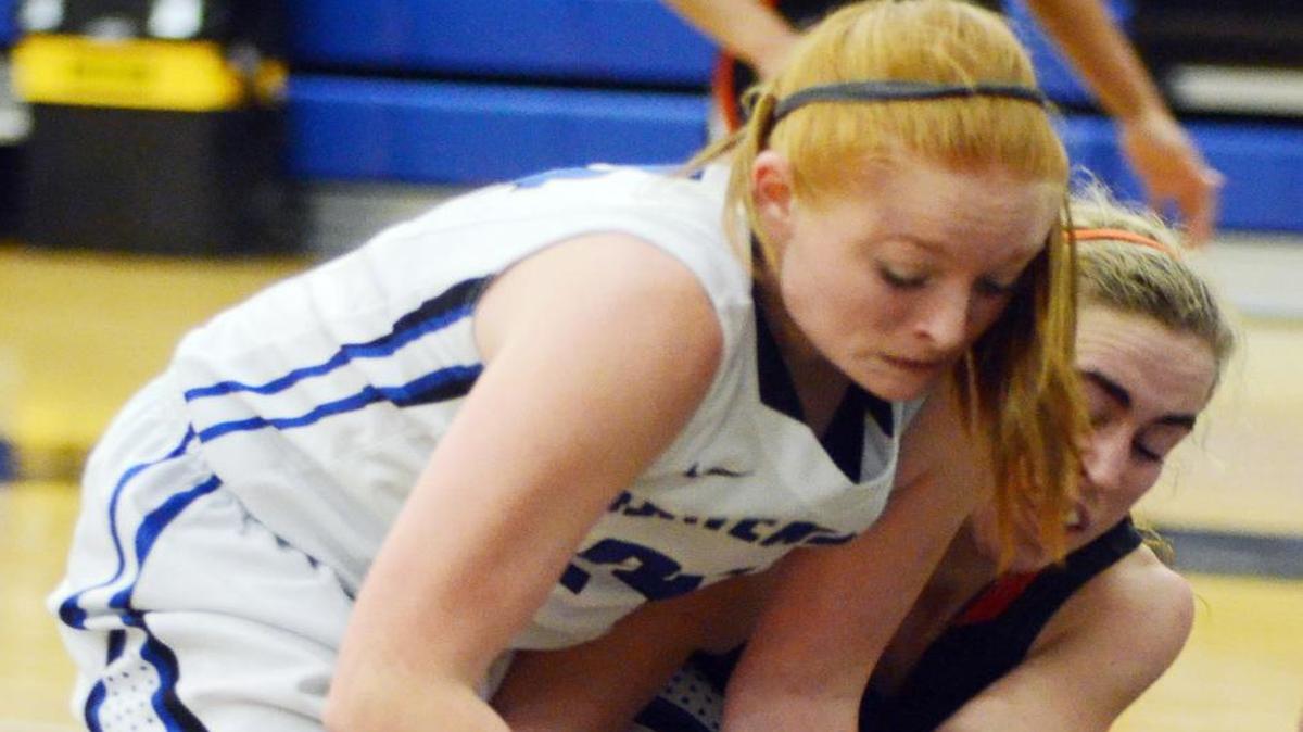 Burleson Centennial forward Kayleigh Benson, left, and Aledo’s Cameron Huddleston contest a loose ball, Jan. 22, 2016.