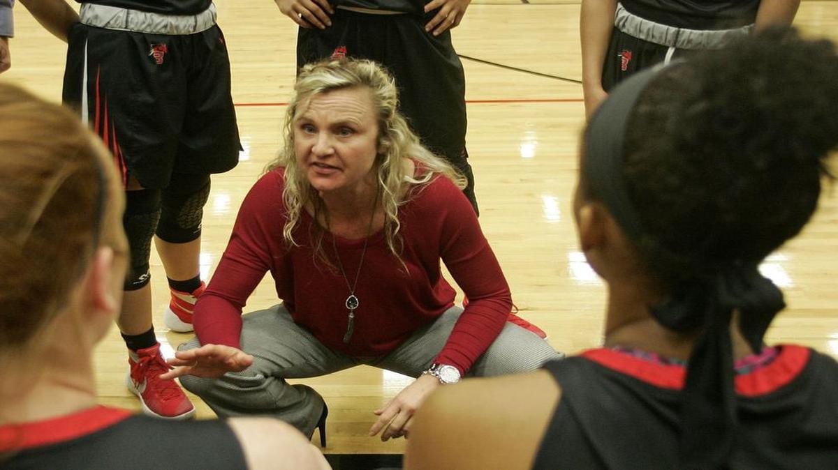 Legacy head coach Michelle Morris talks to the team during a timeout vs. Timberview in a girls high school basketball game on Tuesday night Feb. 02, 2016.