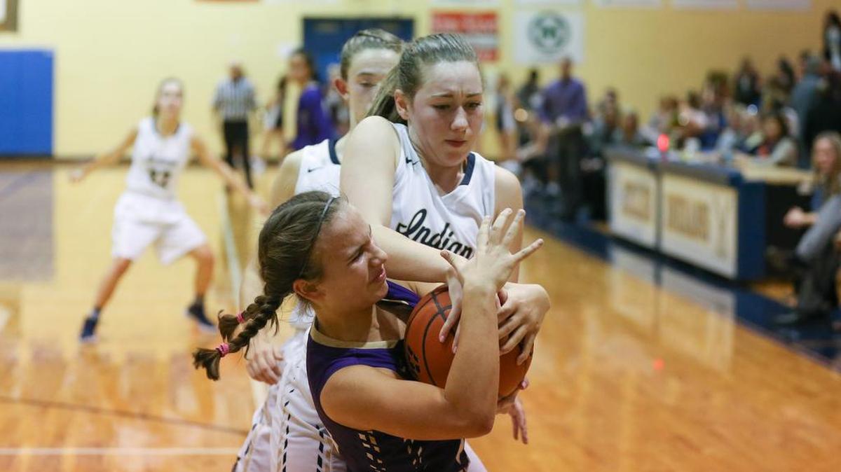 Mallory Lockhart wrestles a Timber Creek player for the ball in recent play. She’s almost the only member of last year’s squad left.