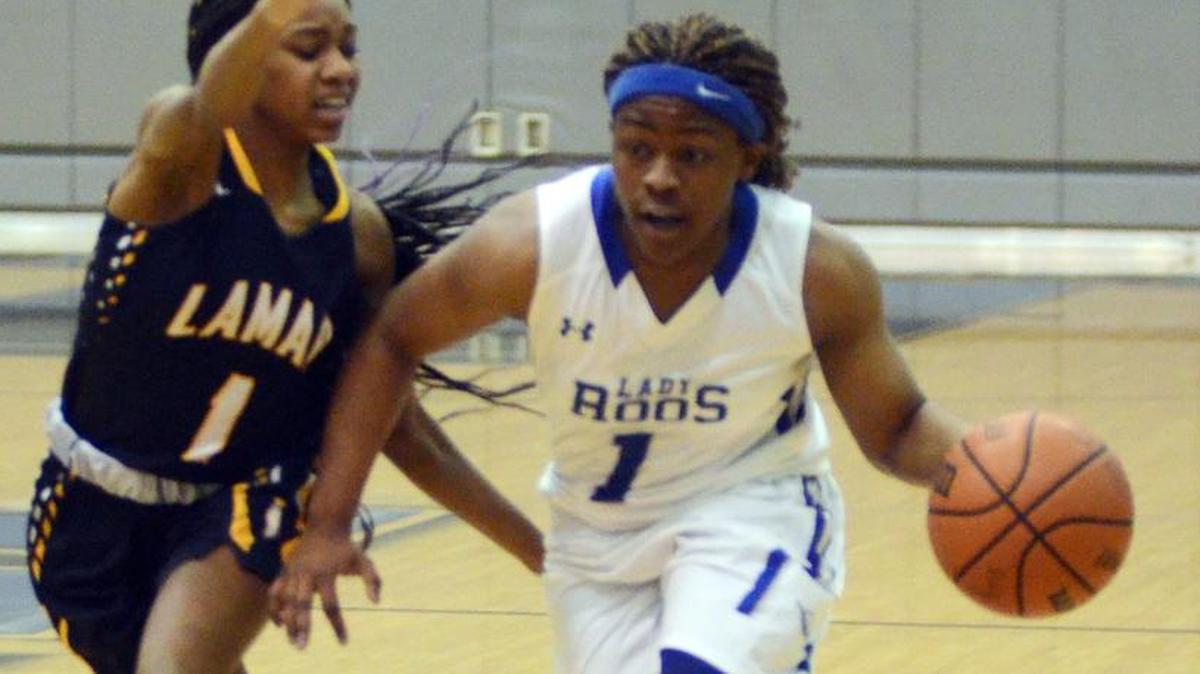 From 2016, Arlington Lamar’s Pam Byrd, left, defends against Weatherford’s Anna Jefferson Polk.
