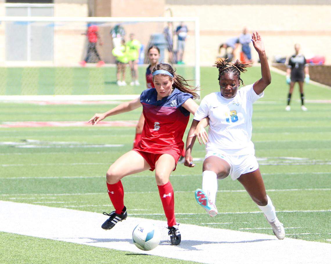 Grapevine’s Samanth Lumpkin (6), left, battles for the ball with Frisco’s London Young (18), right, in the Class 5A state championship game on Saturday, April 15, 2023 at Birkelbach Field in Georgetown, Texas.