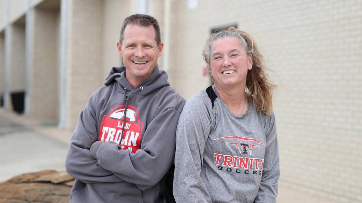 Kurt Clawson and Patti Callahan. Callahan will take over head coaching while Clawson is deployed.