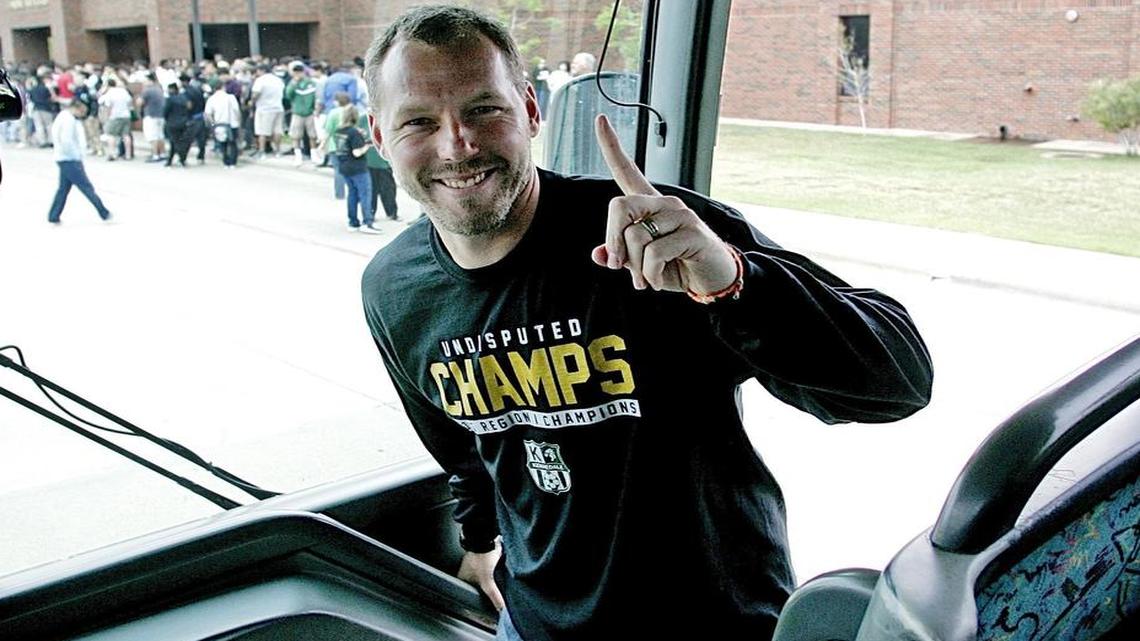 Head coach Michael Strange signals number one as they head off to the UIL State Championship Tournament in Georgetown Tuesday morning April 14, 2015. Students, staff and parents cheered the team on to the game. Their game will be Wednesday at 11a.m.