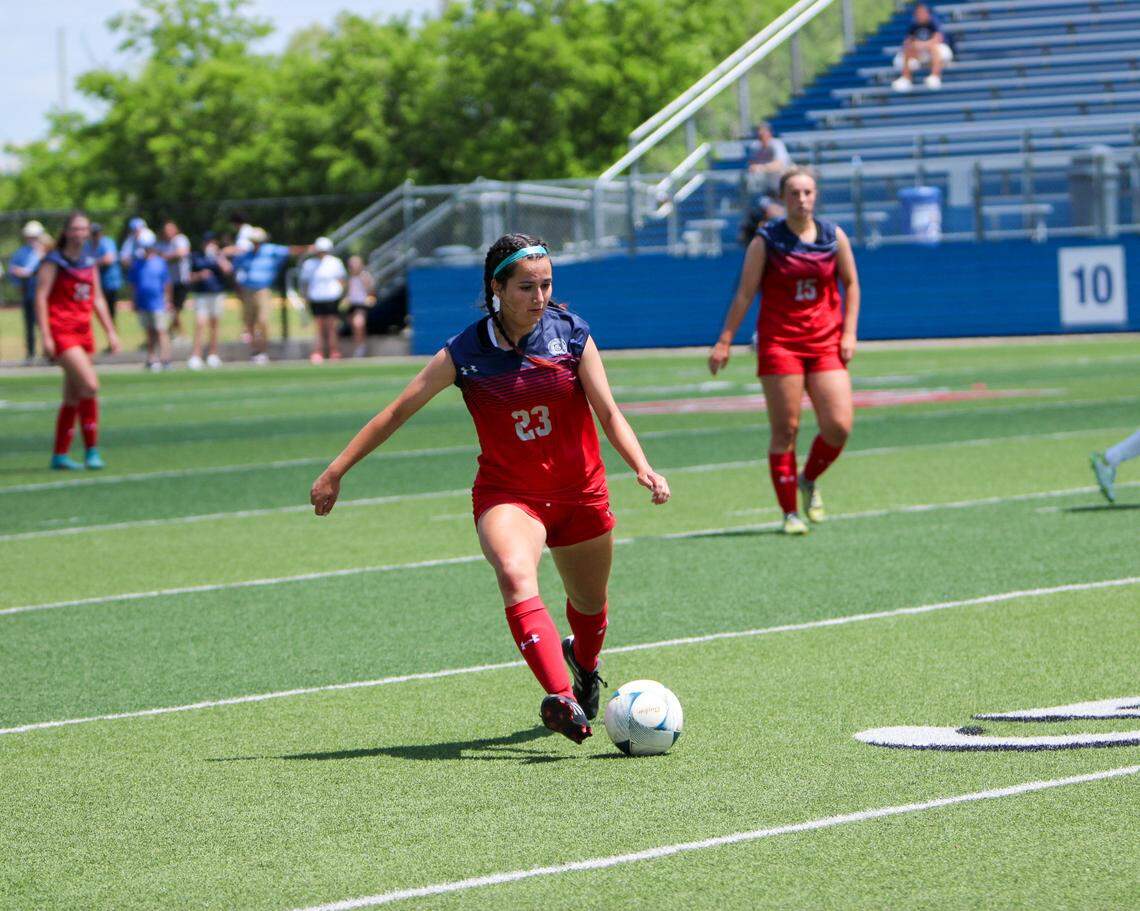 Grapevine midfielder Olivia Nevin looks for room against Frisco in the Class 5A state championship game on Saturday, April 15, 2023 at Birkelbach Field in Georgetown, Texas.